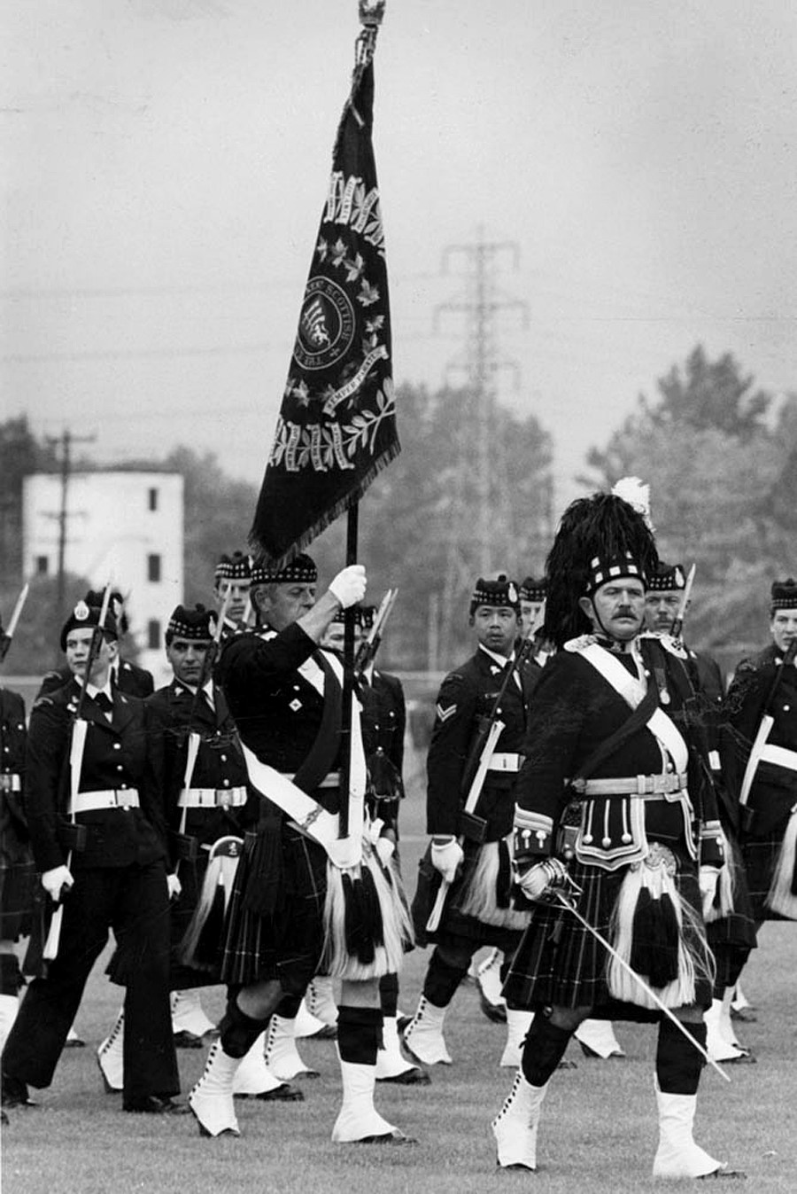 March past during the presentation and trooping of new Colours to The Essex and Kent Scottish during the regiment's centennial year in 1985.  Photo courtesy of the Windsor Star.